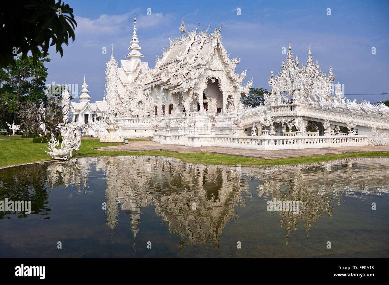 Horizontal view of Wat Rong Khun, the White Temple, in Chiang Rai. Stock Photo