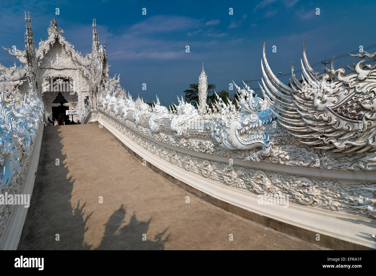 Horizontal view of Wat Rong Khun, the White Temple, in Chiang Rai. Stock Photo