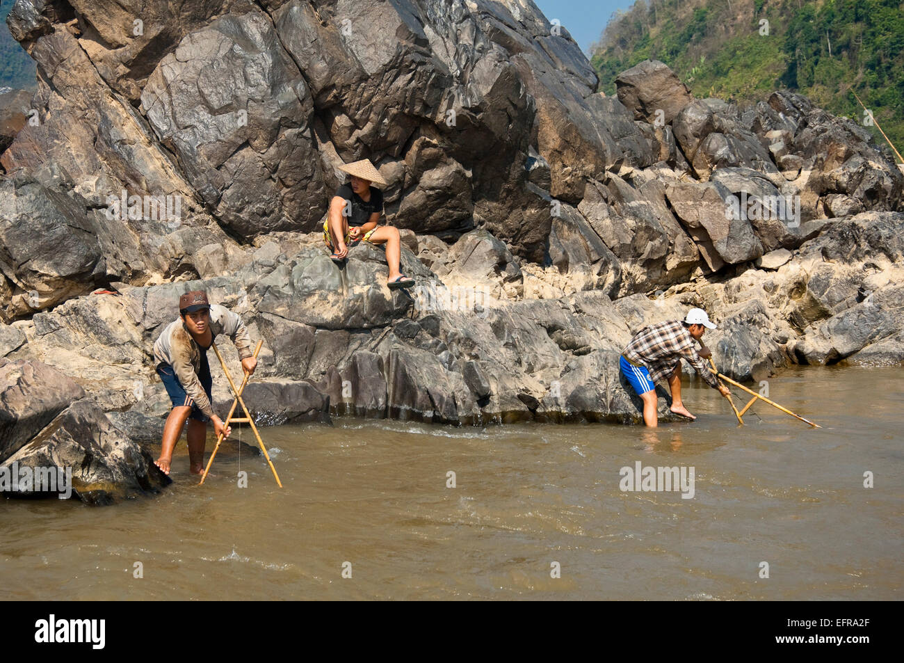 File:Fishing boy in Laos 4 (cropped2).jpg - Wikimedia Commons