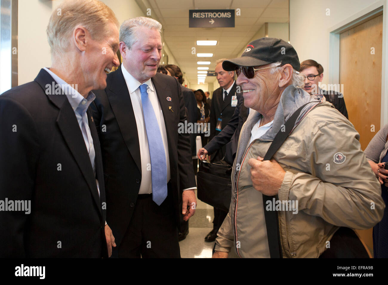 US Senator Bill Nelson, left, and former Vice President Al Gore greet singer Jimmy Buffett, right, the Kennedy Space Center prior to the planned liftoff of NOAA Deep Space Climate Observatory mission, or DSCOVR, aboard a SpaceX Falcon 9 rocket February 8, 2015 in Cape Canaveral, Florida. Stock Photo