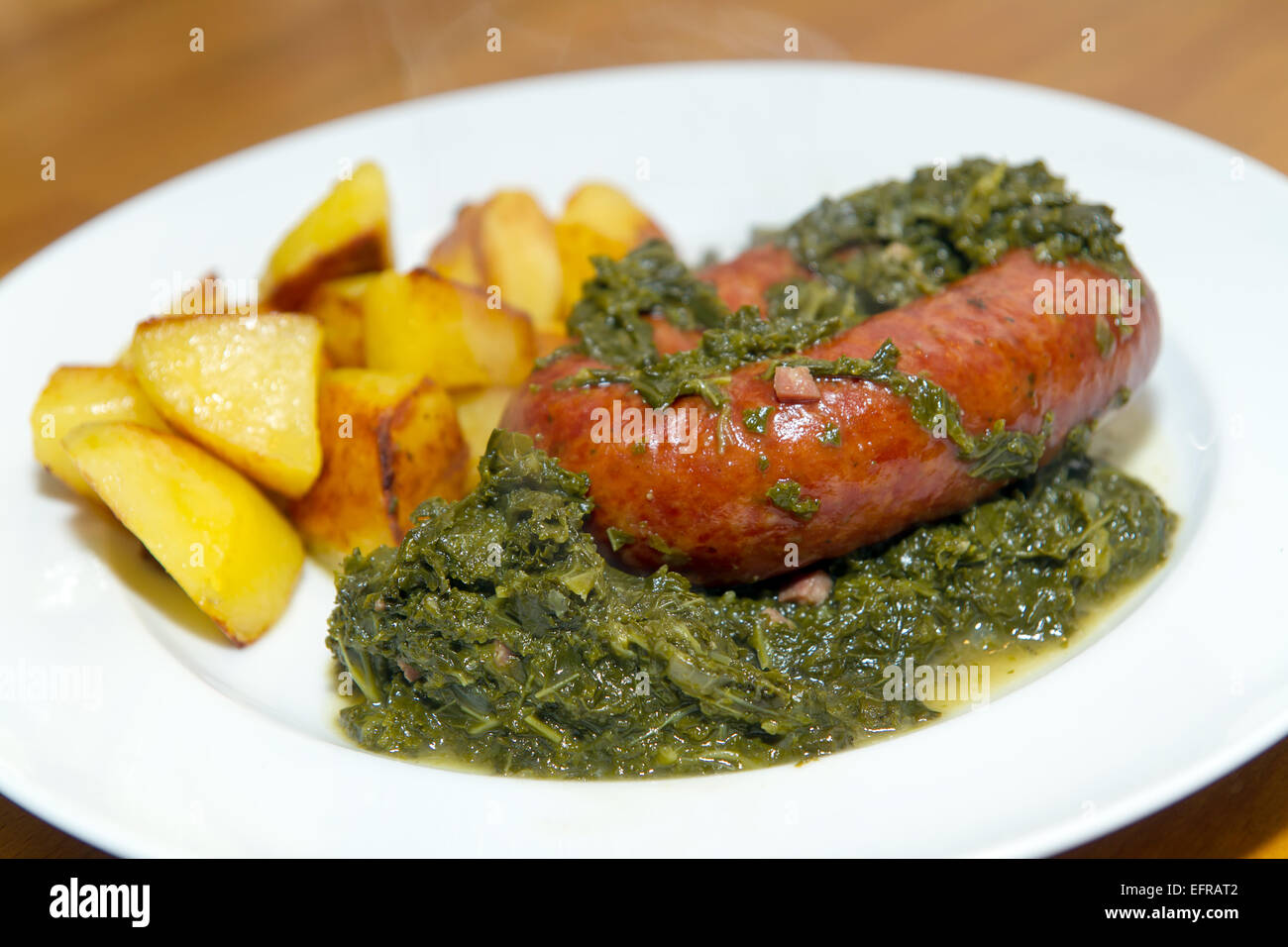 green kale with sausage and potatoes Stock Photo Alamy