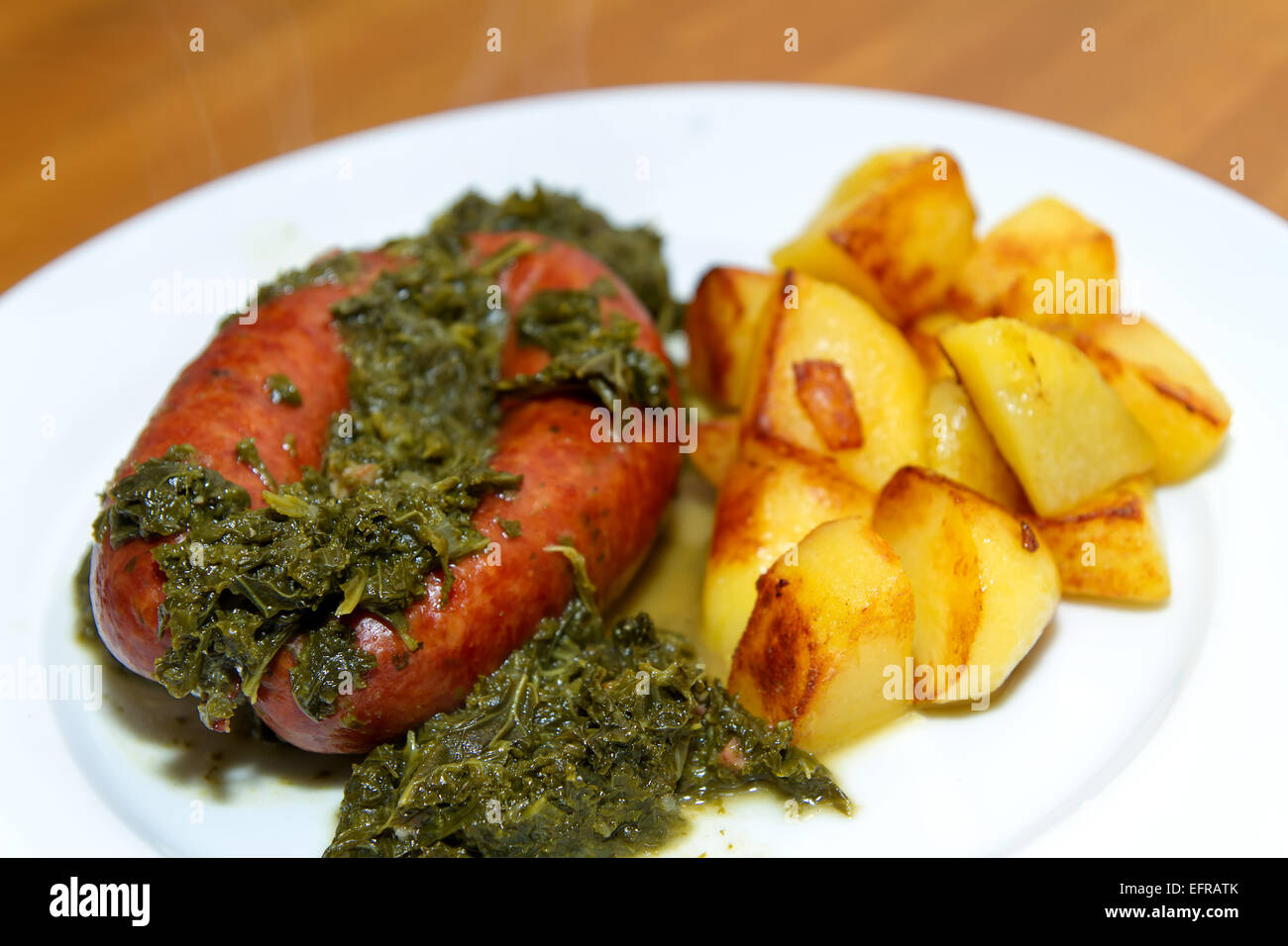 green kale with sausage and potatoes Stock Photo Alamy