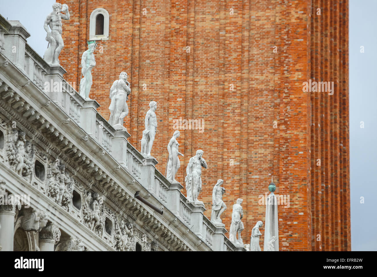 Statues on the exterior of the National Library of Saint Mark in Venice, Italy. Stock Photo