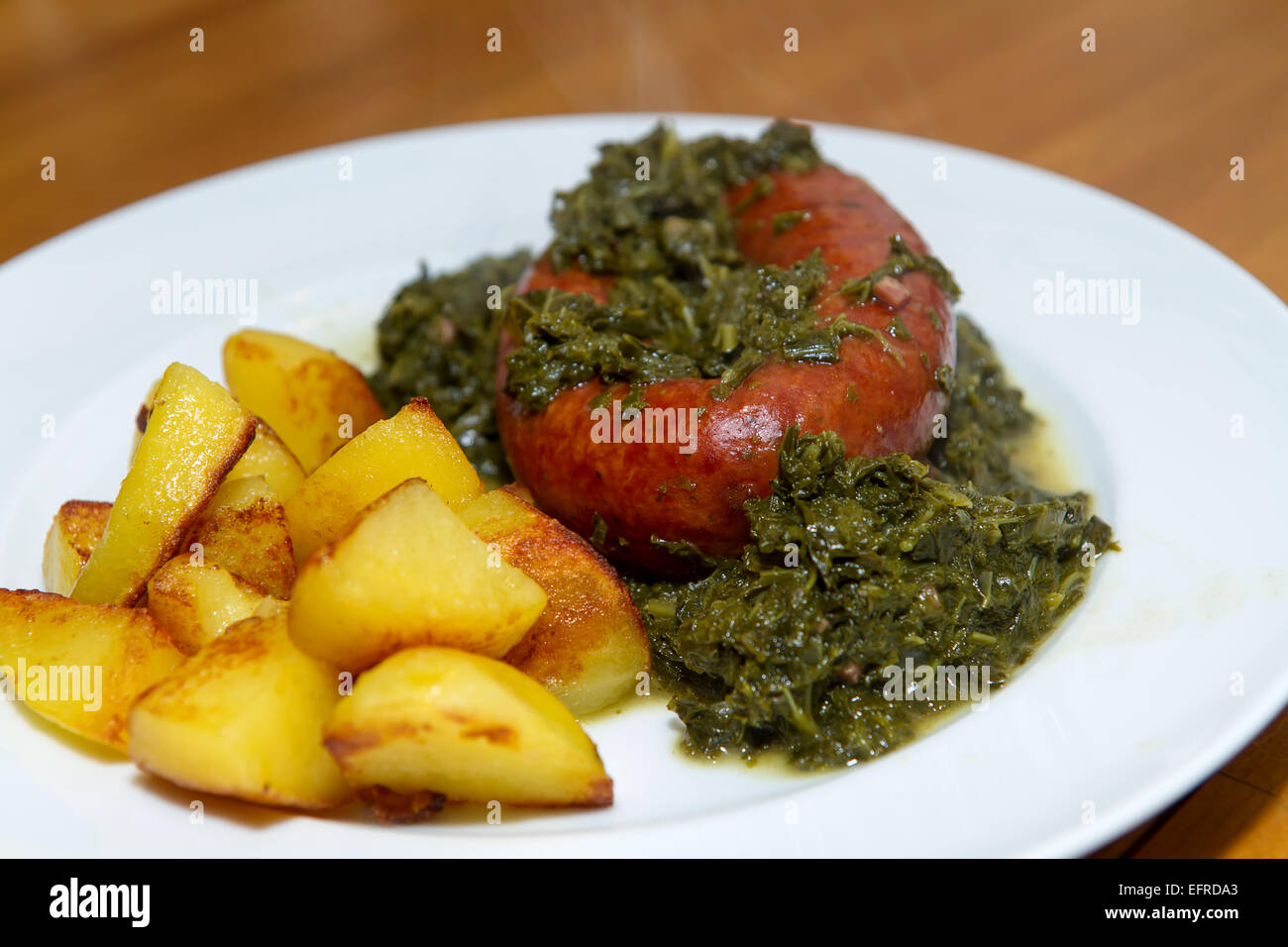green kale with sausage and potatoes Stock Photo Alamy