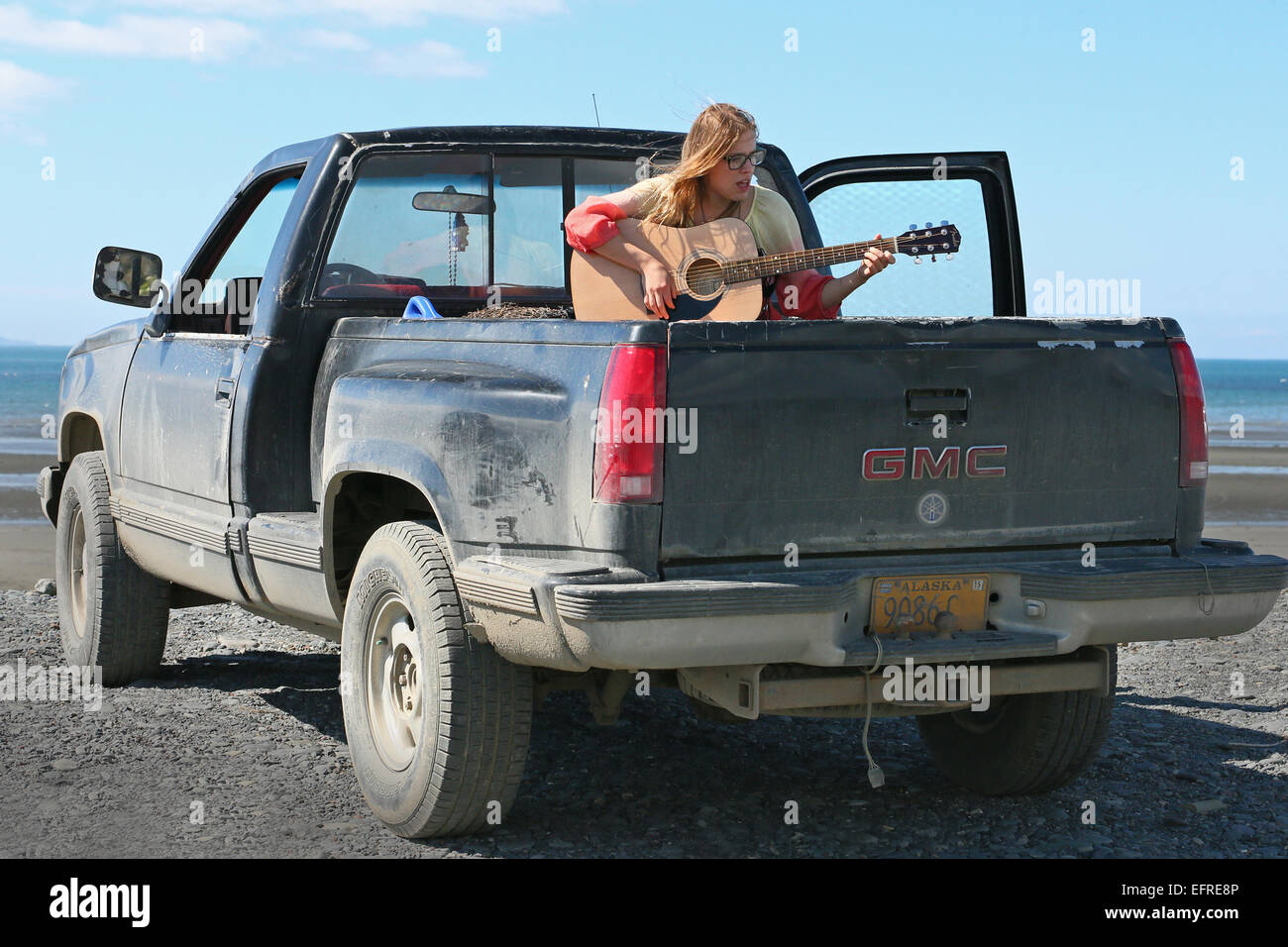 Bed Of A Truck >> Young Lady Playing Her Guitar Sitting On The Bed Of A Truck In Homer Bed Of A Truck >> Young Lady Playing Her Guitar Sitting On The Bed Of A Truck In Homer