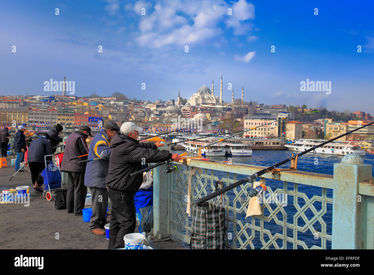 Fisherman on Galata Bridge, Bosphorus, Istanbul, Turkey Stock Photo