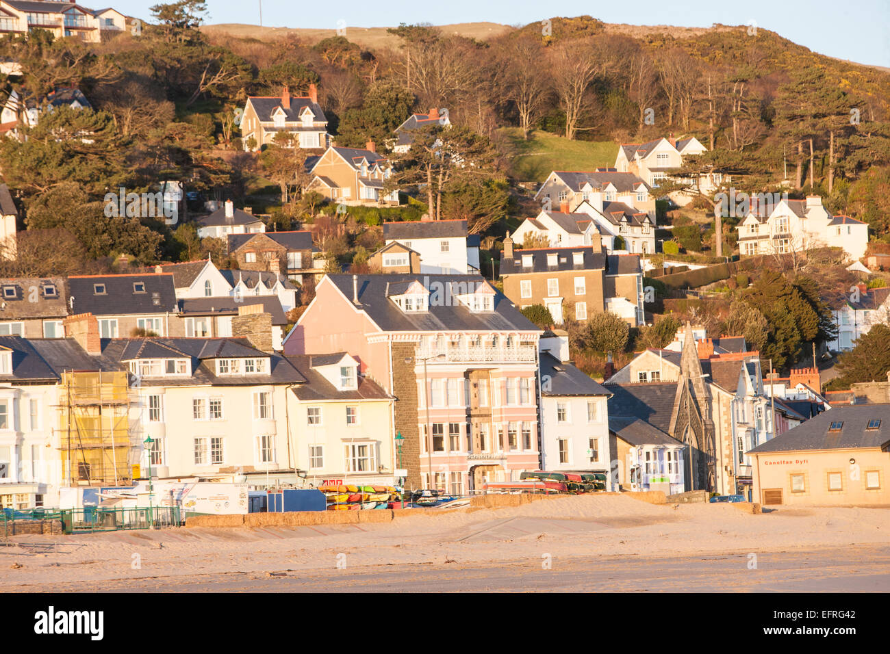 Colourful houses at beach, waterfront at sunset in Aberdyfi Aberdovey