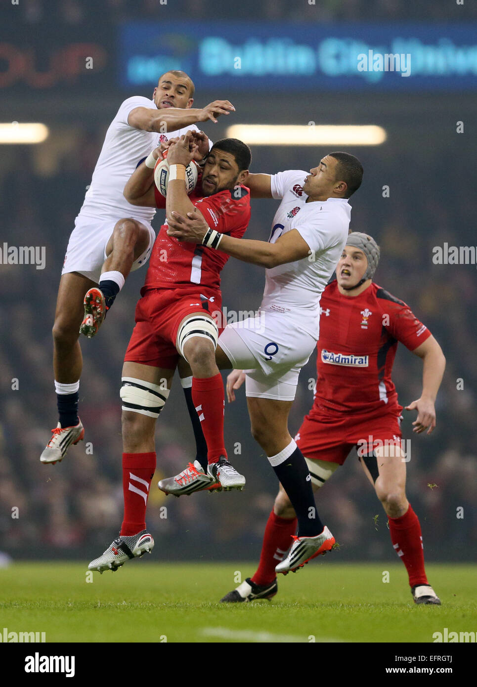 Cardiff, UK. 6th Feb, 2015. Taulupe Faletau of Wales wins the ball from Jonathan Joseph and Luther Burrell of England- RBS 6Nations 2015 - Wales vs England - Millennium Stadium - Cardiff - Wales - 6th February 2015 © csm/Alamy Live News Stock Photo