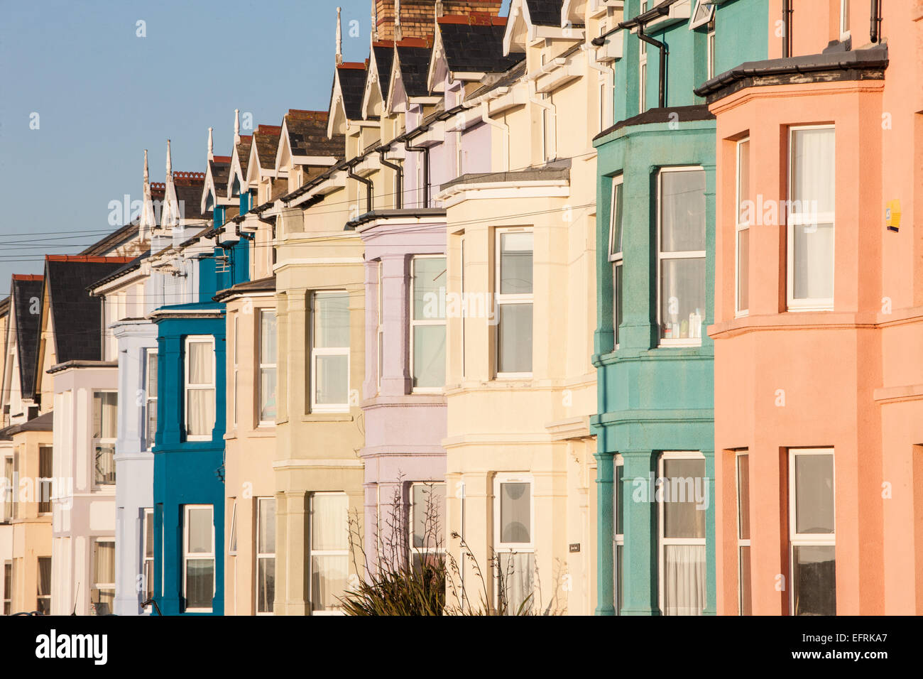 Colourful terraced houses at sunset in holiday coastal village resort of Borth, north of