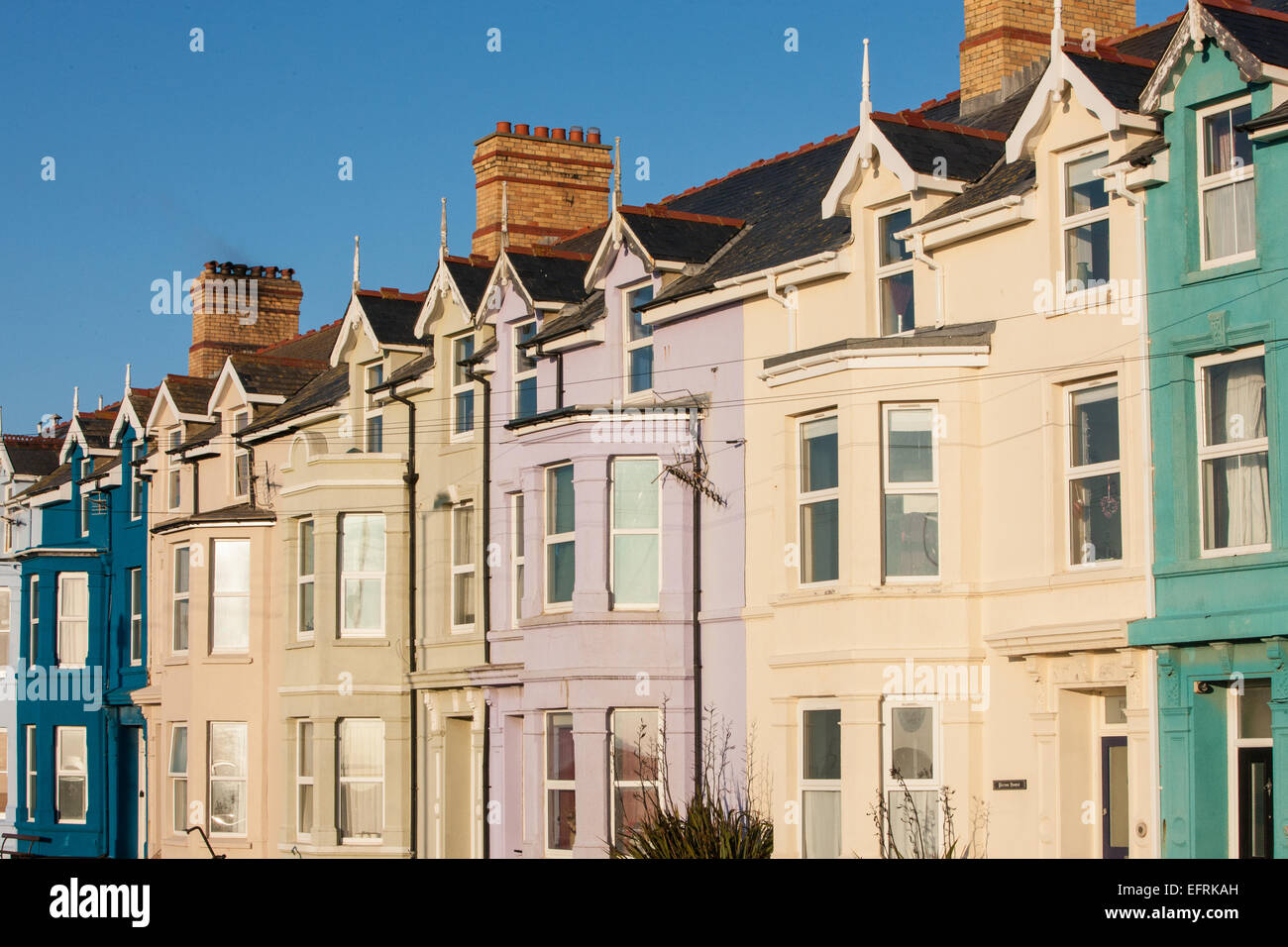 Colourful terraced houses at sunset in holiday coastal village resort of Borth, north of