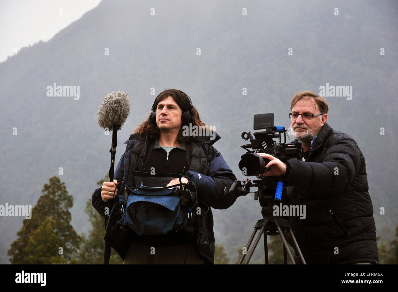 Cameraman and sound recordist at work on the West Coast, New Zealand Stock Photo