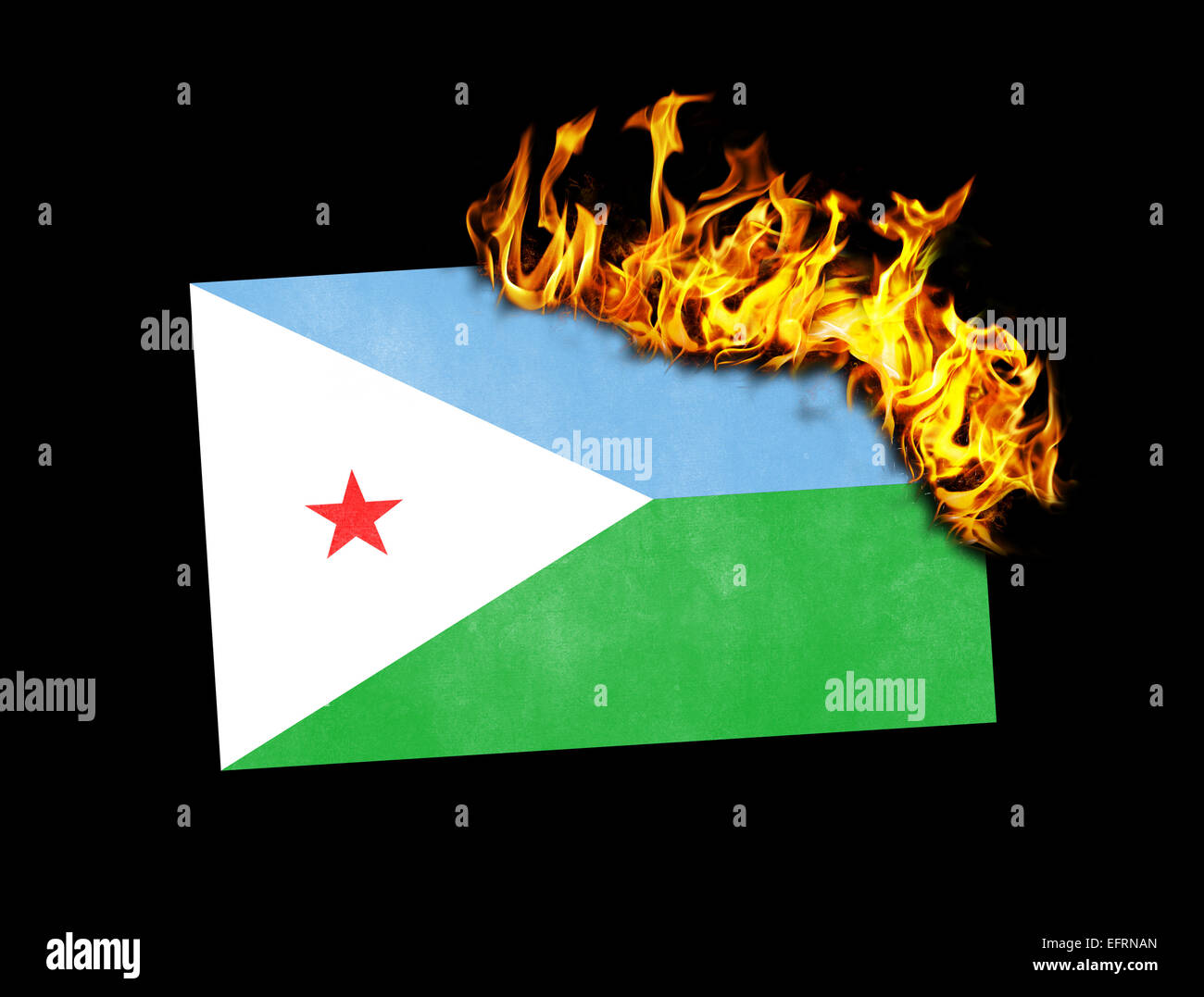 Flag burning - concept of war or crisis - Algeria Stock Photo
