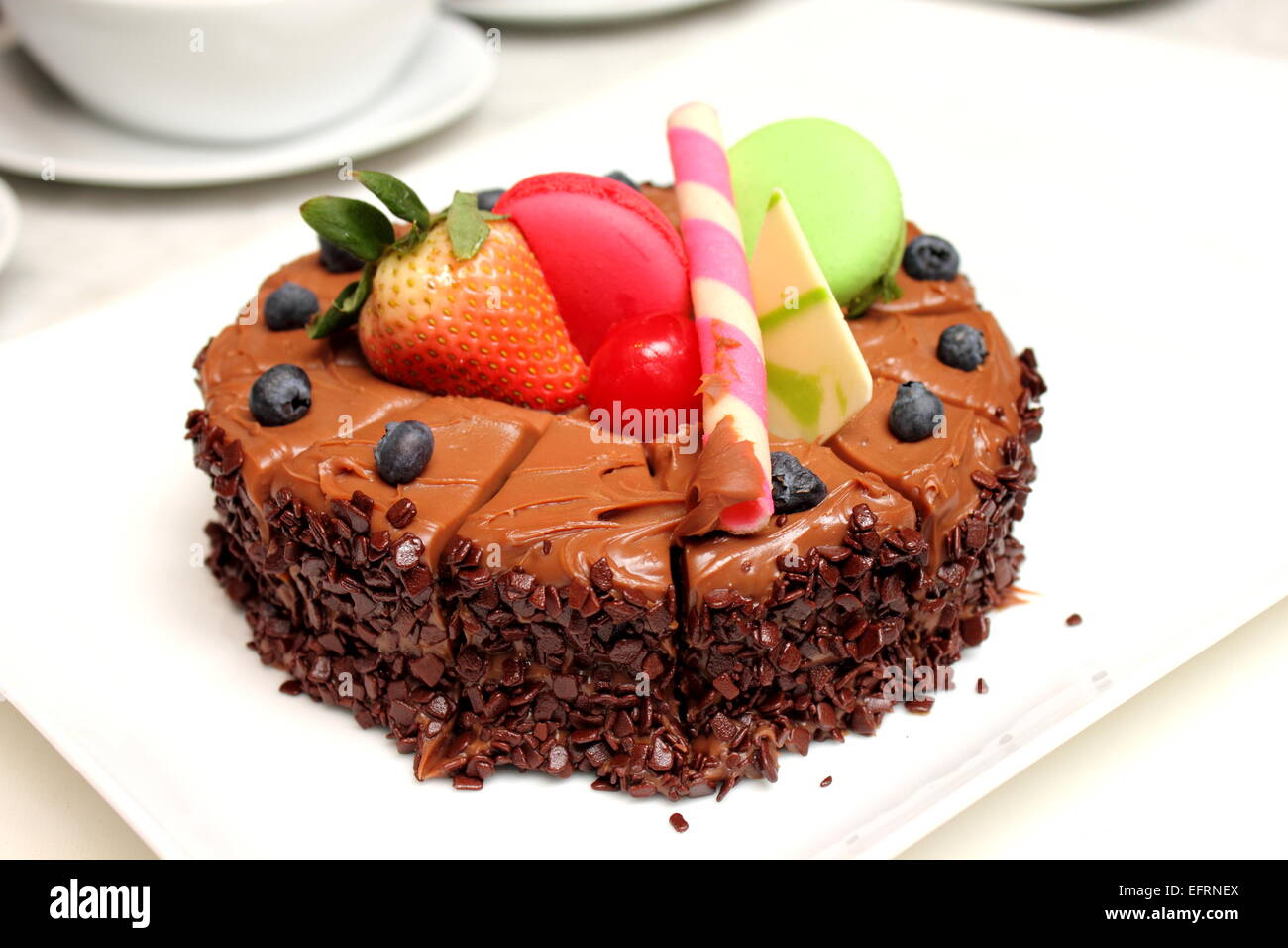A Chocolate cake with fresh fruit decoration Stock Photo - Alamy