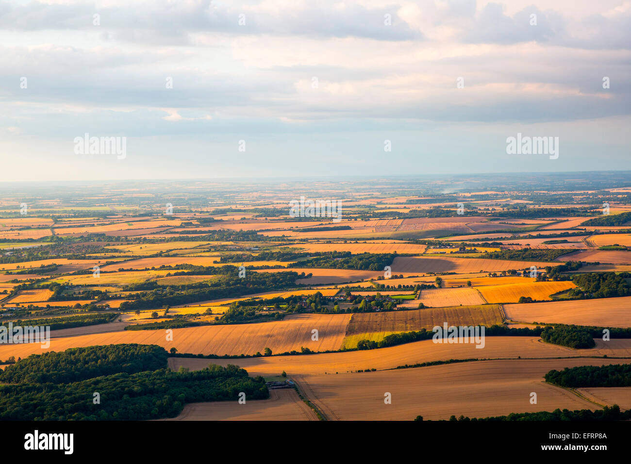Elevated view from hot air balloon above rural fields, Oxfordshire, England Stock Photo