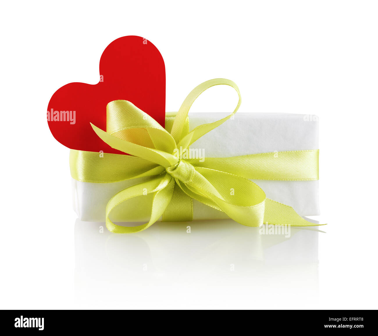 Festive gift box with ribbon and red heart on a white background ...