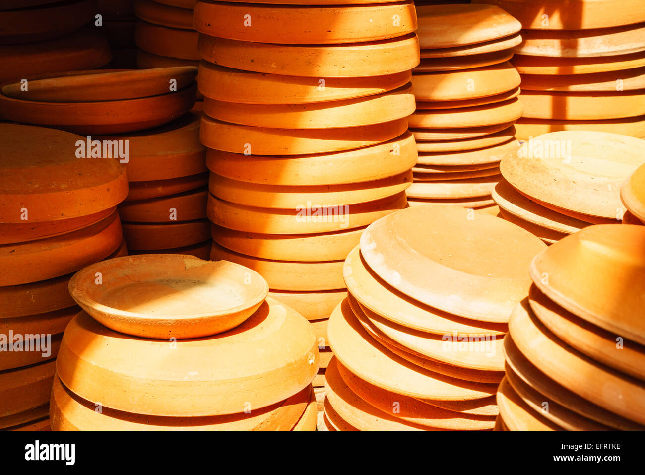 a bunch of terracotta flower pot saucers Stock Photo Alamy