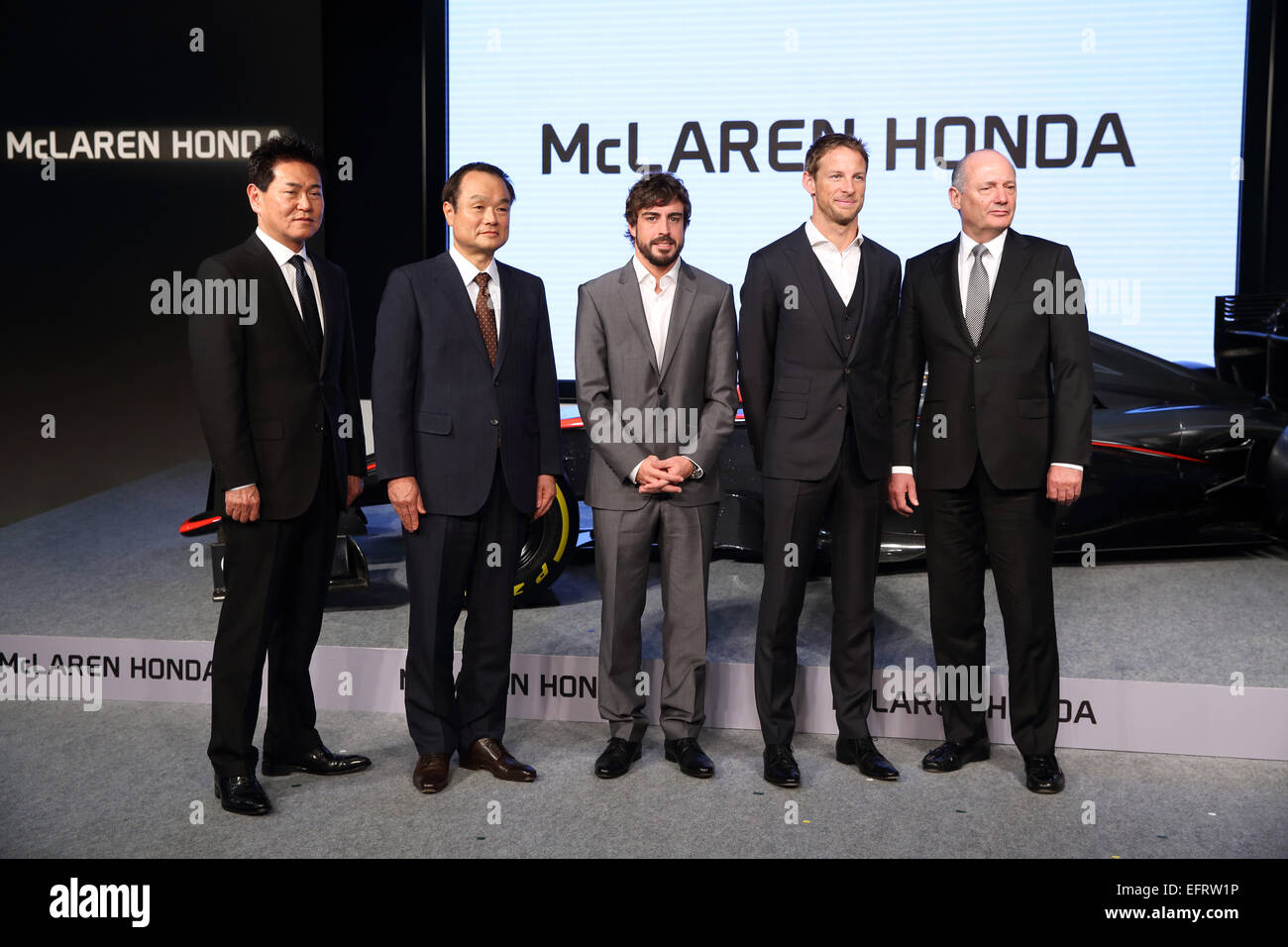 (L-R) Yasuhisa Arai, Takanobu Ito (Honda), Fernando Alonso, Jenson Button, Ron Dennis (McLaren), FEBRUARY 10, 2015 - F1 : (L-R) Honda R&D Co., Ltd. Senior Managing Officer, Chief Officer of Motor Sport Yasuhisa Arai, Honda Motor Co., Ltd. President, Chief Executive Officer and Representative Director Takanobu Ito, McLaren-Honda driver Fernando Alonso, McLaren-Honda driver Jenson Button, and McLaren Technology Group Chairman and Chief Executive Officer Ron Dennis pose with the McLaren Honda MP4-30 during a press conference at the Honda Motor Co. headquarters in Tokyo, Japan. (Photo by Hideki Yo Stock Photo