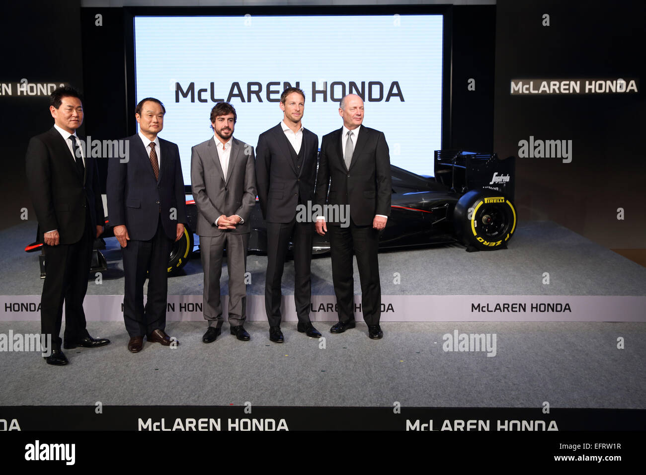 (L-R) Yasuhisa Arai, Takanobu Ito (Honda), Fernando Alonso, Jenson Button, Ron Dennis (McLaren), FEBRUARY 10, 2015 - F1 : (L-R) Honda R&D Co., Ltd. Senior Managing Officer, Chief Officer of Motor Sport Yasuhisa Arai, Honda Motor Co., Ltd. President, Chief Executive Officer and Representative Director Takanobu Ito, McLaren-Honda driver Fernando Alonso, McLaren-Honda driver Jenson Button, and McLaren Technology Group Chairman and Chief Executive Officer Ron Dennis pose with the McLaren Honda MP4-30 during a press conference at the Honda Motor Co. headquarters in Tokyo, Japan. (Photo by Hideki Yo Stock Photo