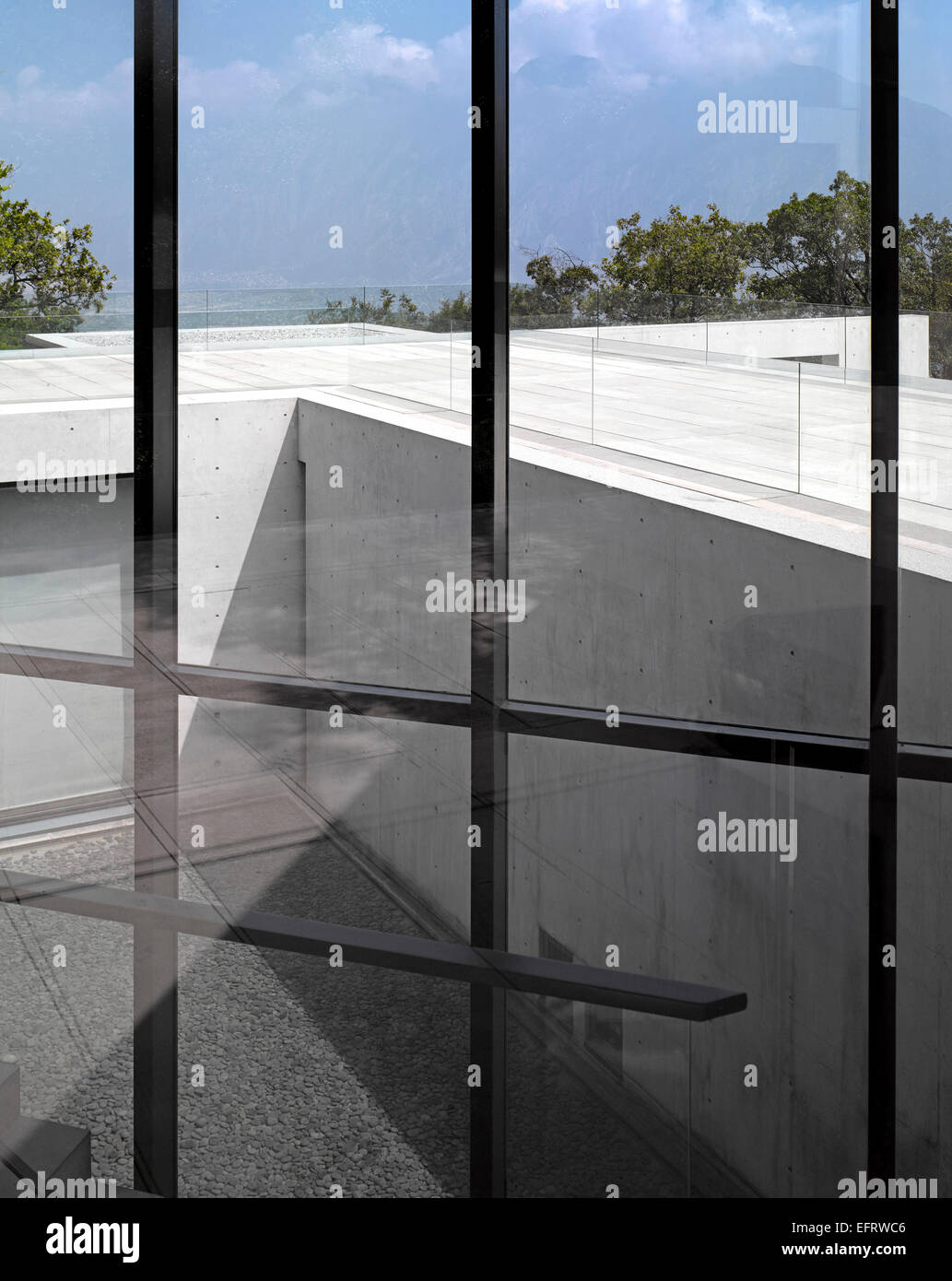 Casa Monterrey, Monterrey, Mexico. Architect: Tadao Ando, 2013. Interior view towards exterior concrete void. Stock Photo