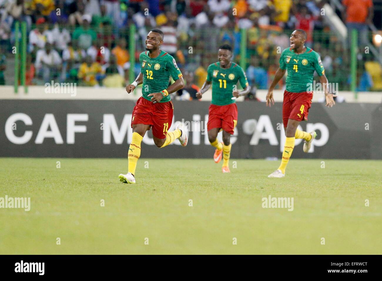 Henry Bedimo Nsame (L) and teammates celebrate his goal against Guinea during their AFCON match at the Nueva Estadio de Malabo on January 24, 2015.The match ended 1-1.Photo/Mohammed Amin/www.pic-centre.com (Equatorial Guinea) Stock Photo