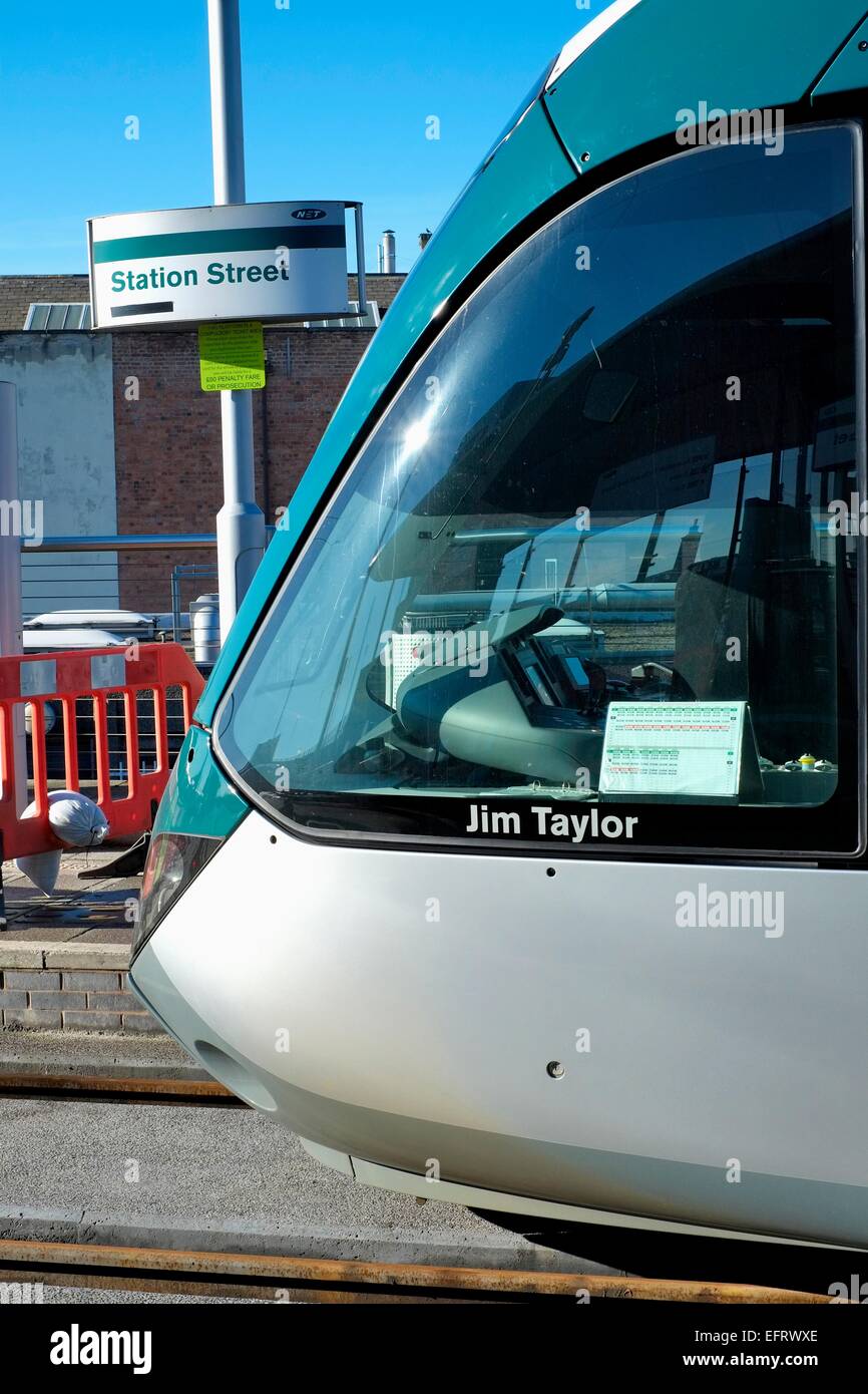 Modern electric trams running on the Nottingham express transit system