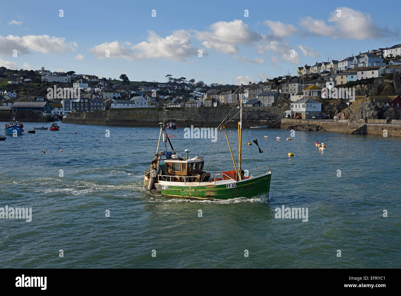 Fowey registered trawler, Lenten Rose FY43 leaving Mevagissey outer harbour, Cornwall, UK Stock Photo