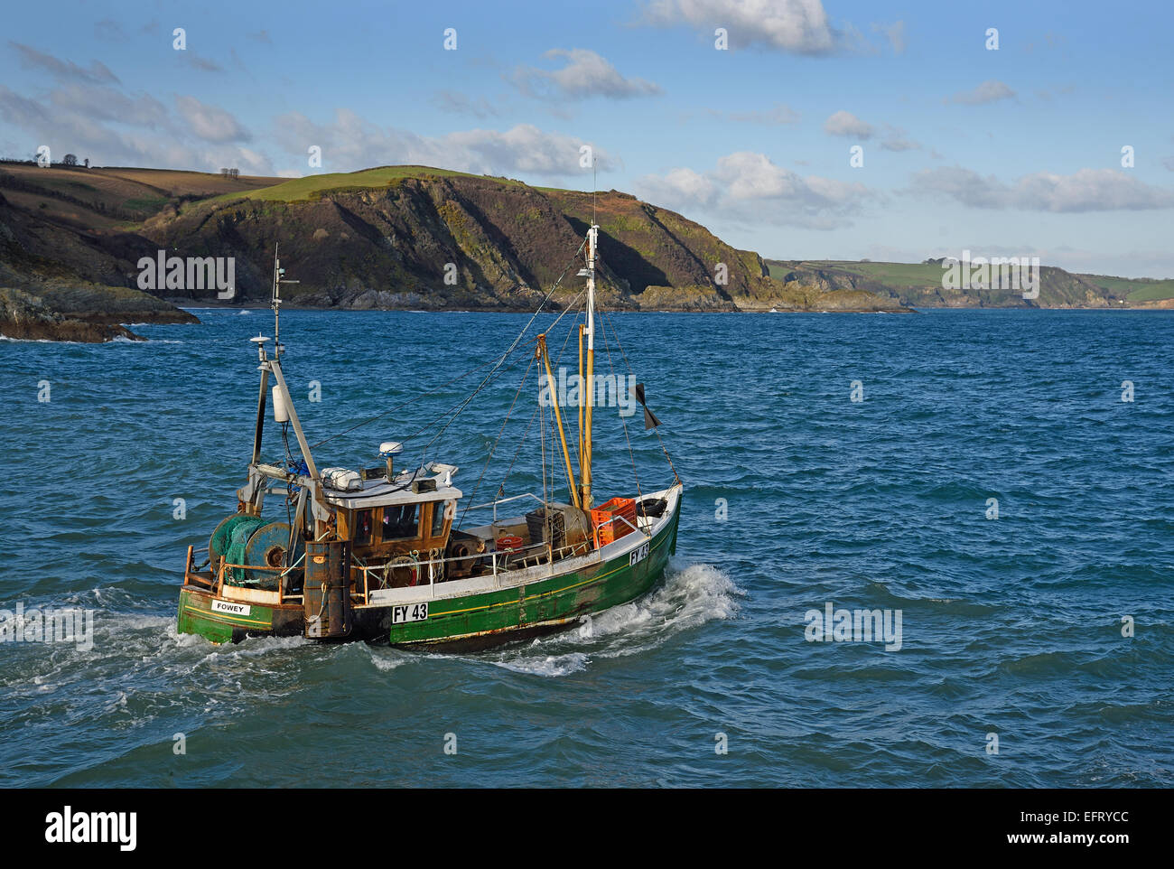 Fowey registered trawler, Lenten Rose FY43 leaving Mevagissey, Cornwall, UK Stock Photo