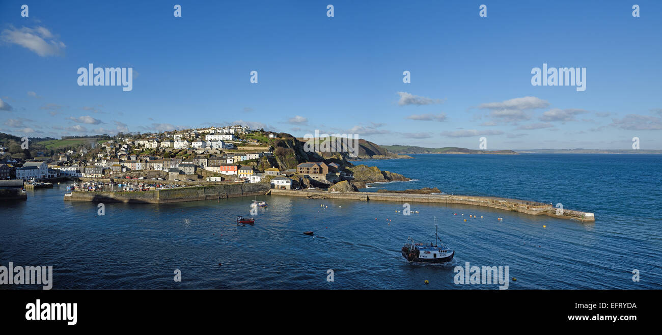 Panoramic view of Motor Trawler Imogen F/470 leaving Mevagissey outer harbour, Cornwall, UK Stock Photo
