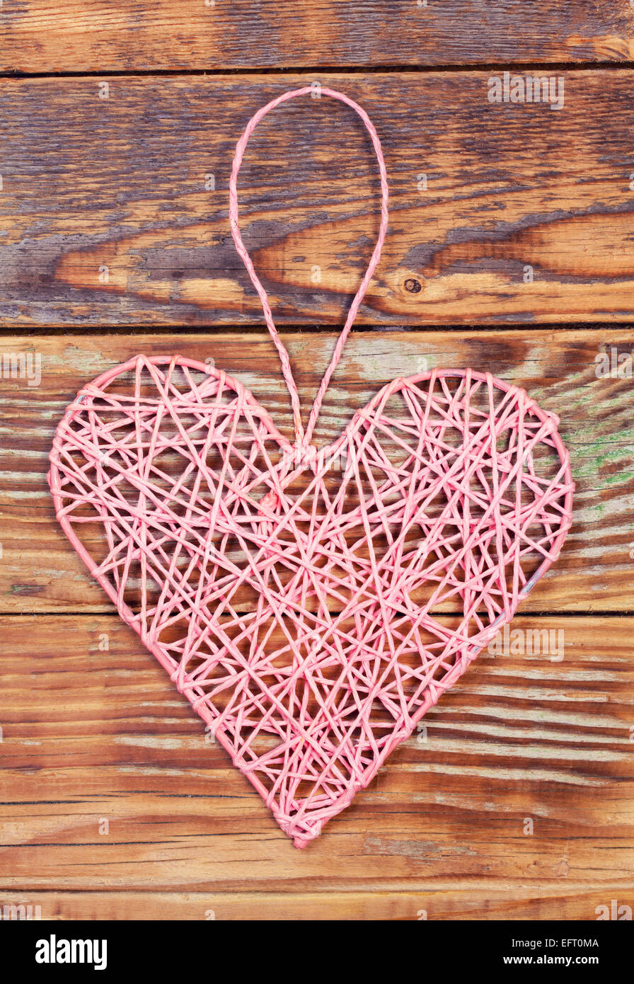 Pink hearts on grunge wooden background Stock Photo