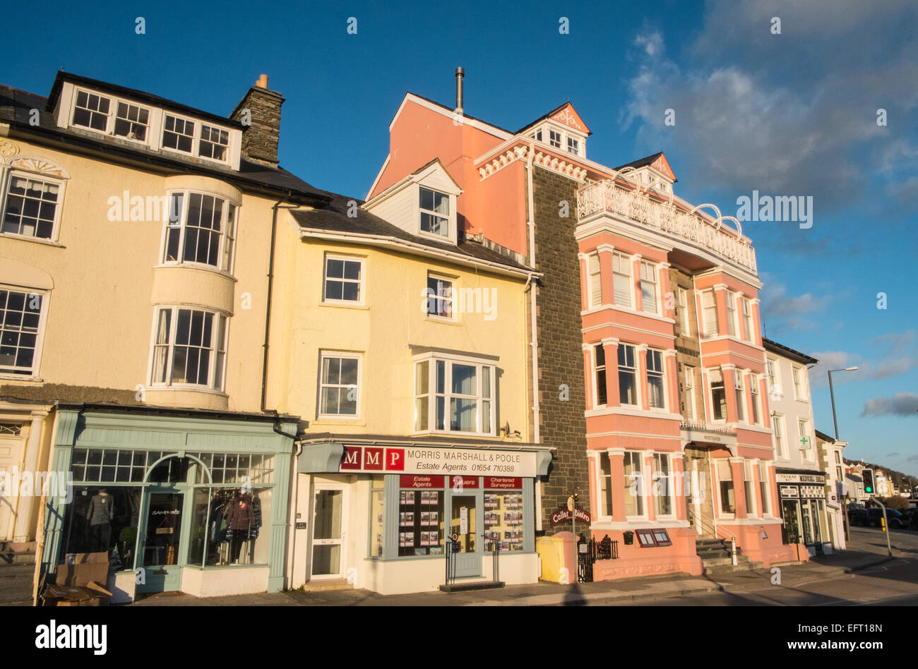 Colourful houses at beach, waterfront at sunset in Aberdyfi / Aberdovey