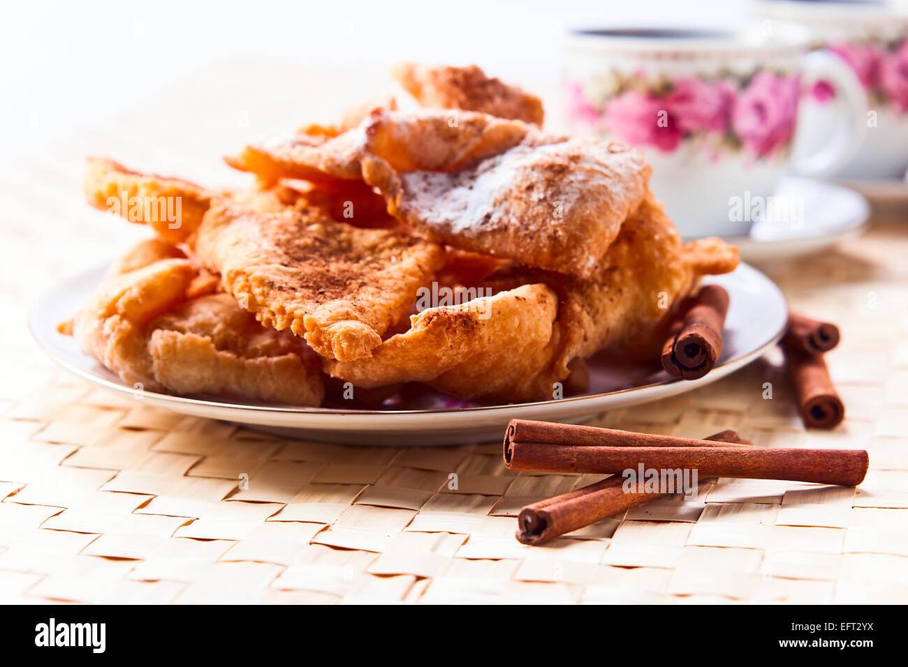 deep fried pastry with sugar and cinnamon Stock Photo Alamy