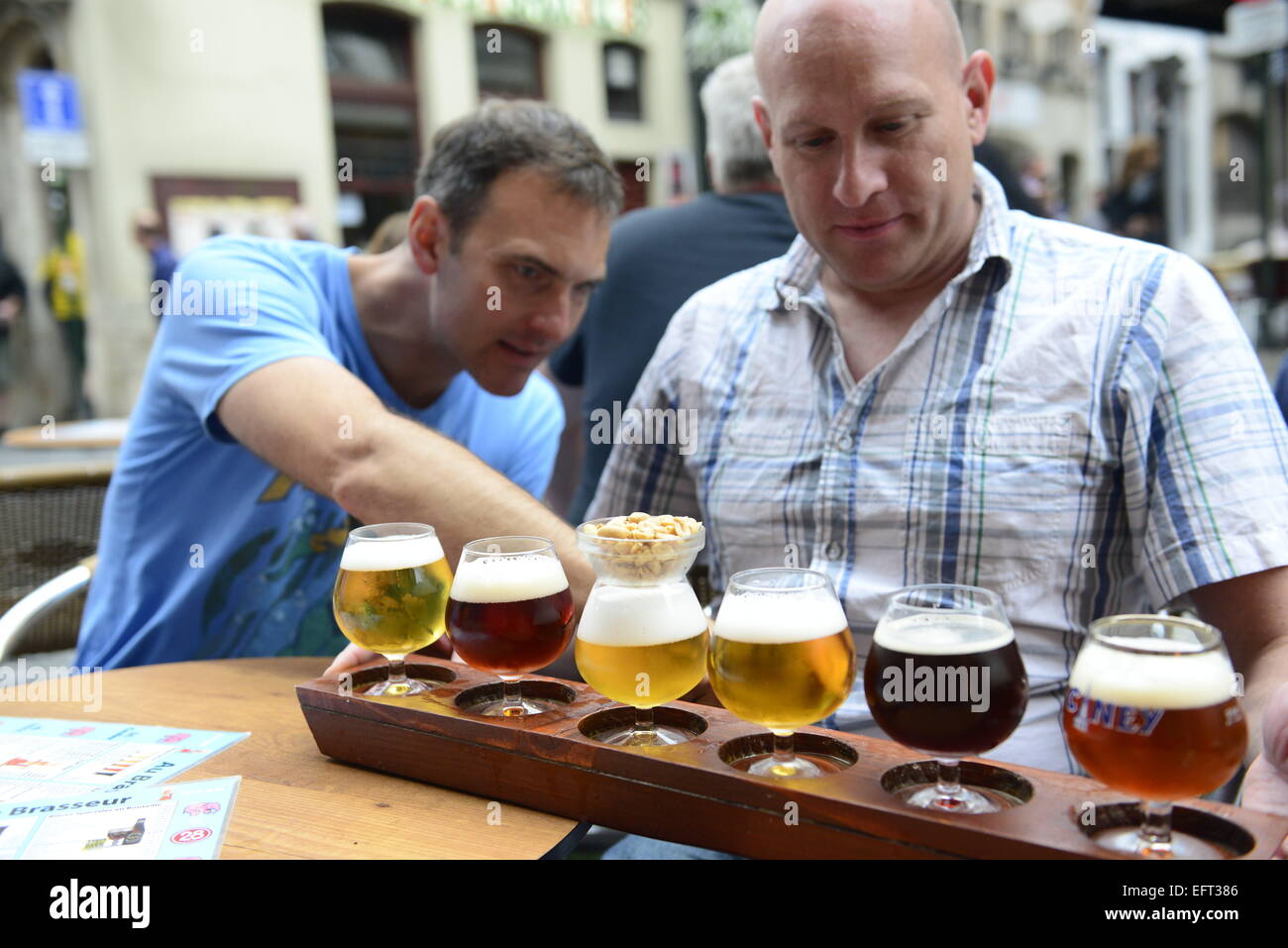 Beer tasting in one of the vibrant bars in the historical center of Brussels Stock Photo Alamy