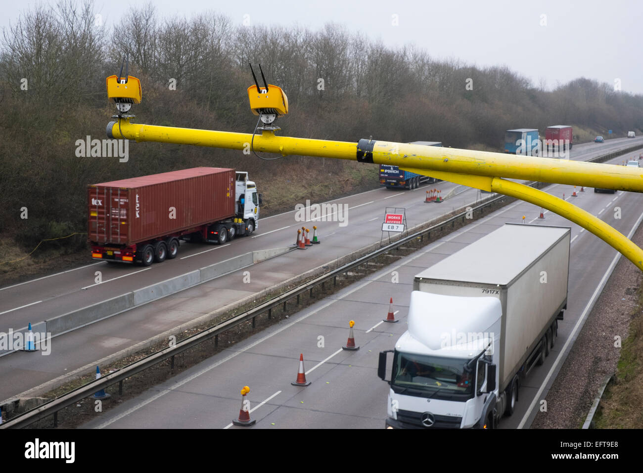 Speed cameras on a gantry overlooking the M54 motorway near Telford in Shropshire, England Stock Photo