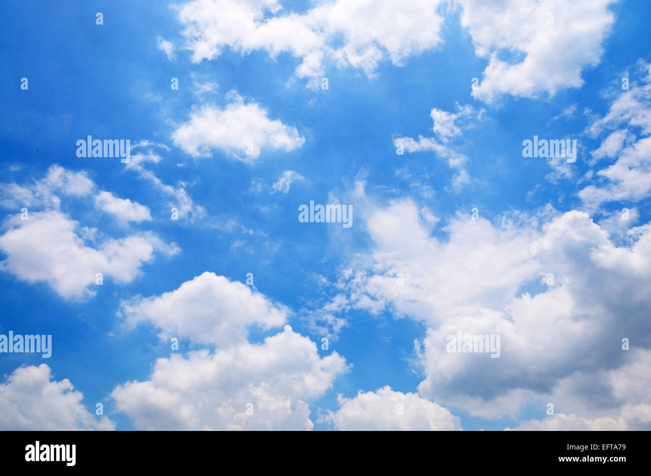 Blue sky with clouds background Stock Photo - Alamy