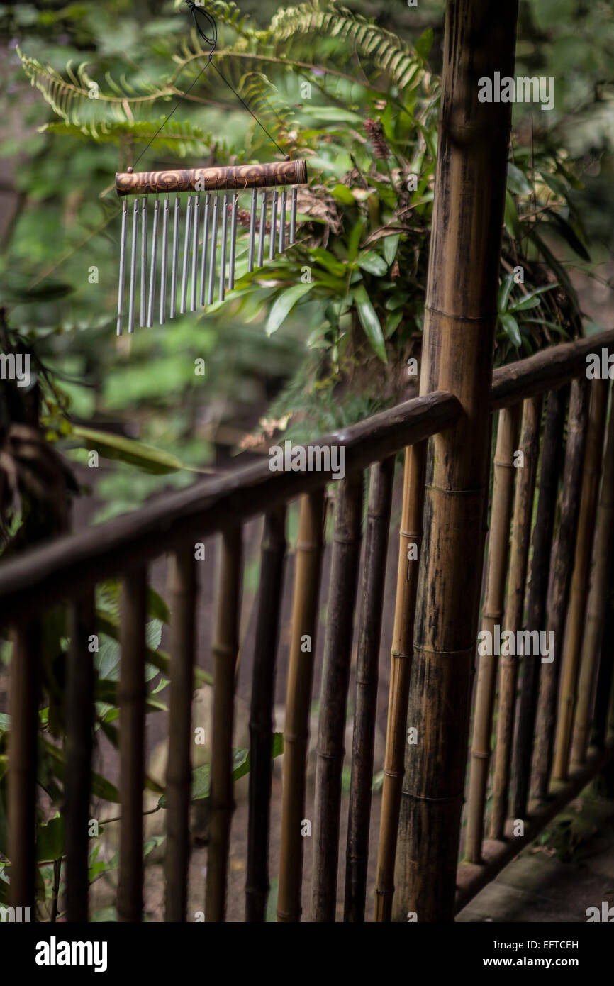 A wind chime outside of a hut in the rainforest. Stock Photo