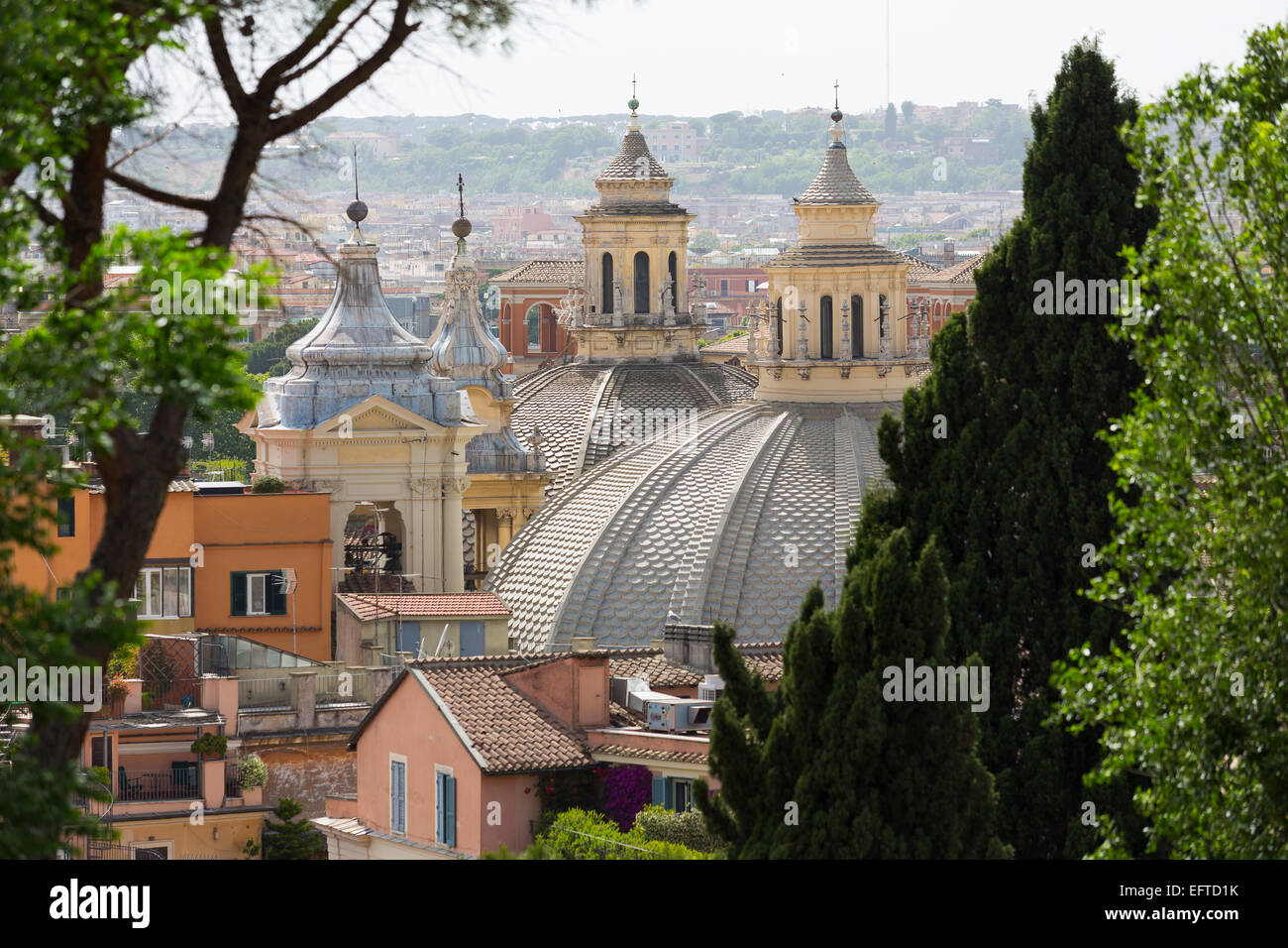 The twin churches and the roman rooftops viewed from Parco del Pincio in Rome, Italy Stock Photo