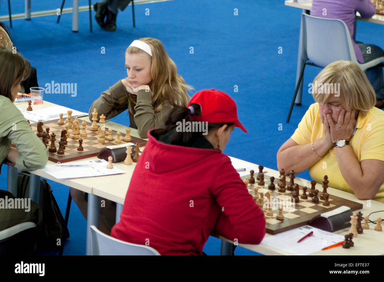 Lara Stock (left) and Vlasta Macek (right) compete in Croatia chess team during 2006 Chess Olympiad in Turin, Italy Stock Photo