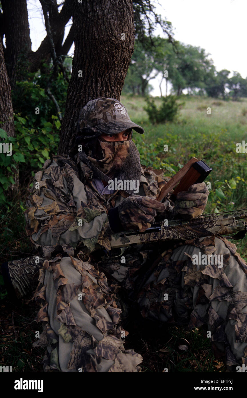 Spring turkey hunter calling turkeys Stock Photo Alamy