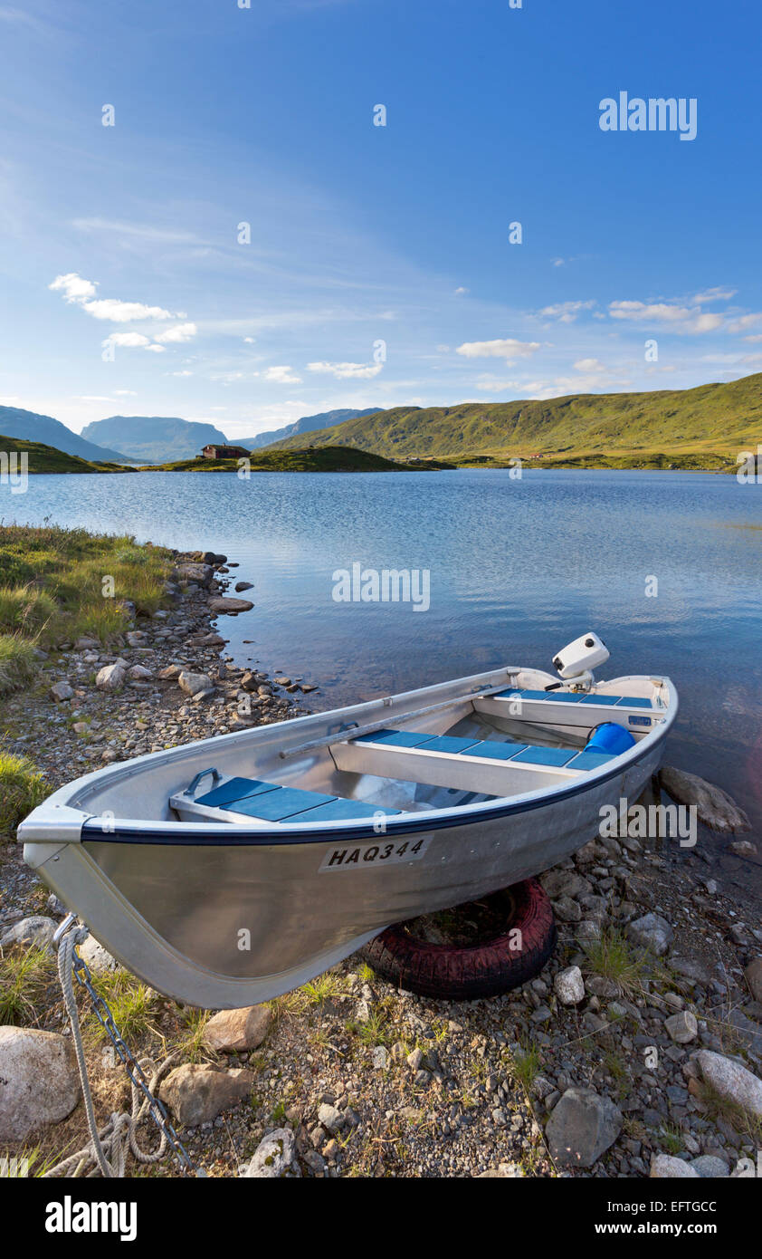 Boat on the shore of Stavatn lake in Norway Stock Photo