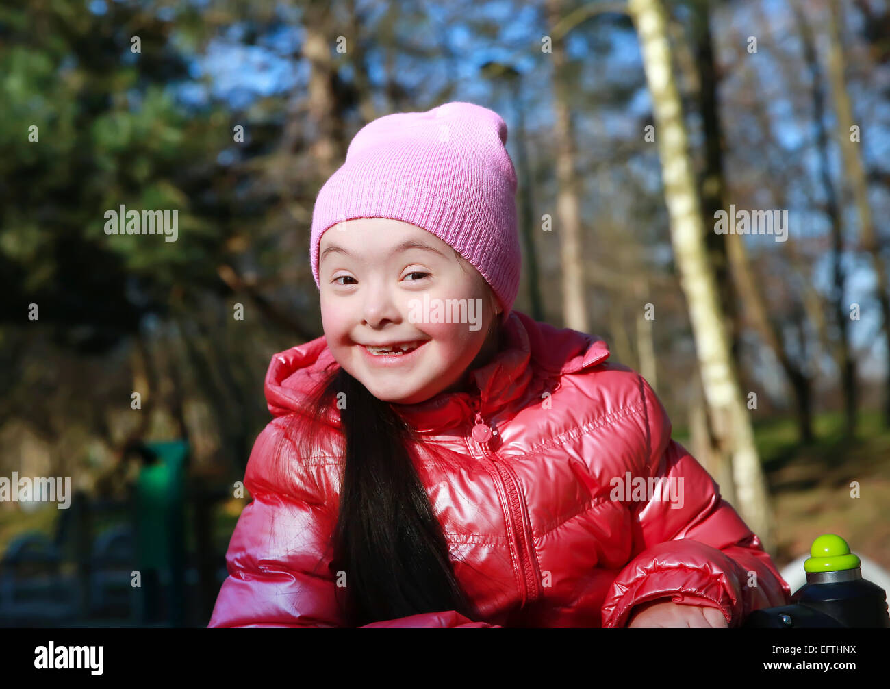 Portrait of beautiful girl on the playground Stock Photo - Alamy