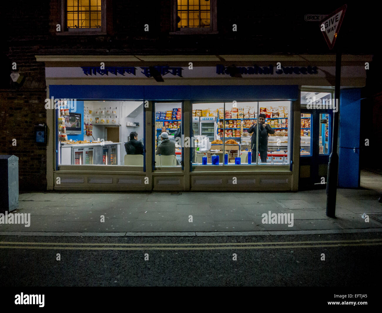 Small shop opened late in Brick Lane, London East End Stock Photo