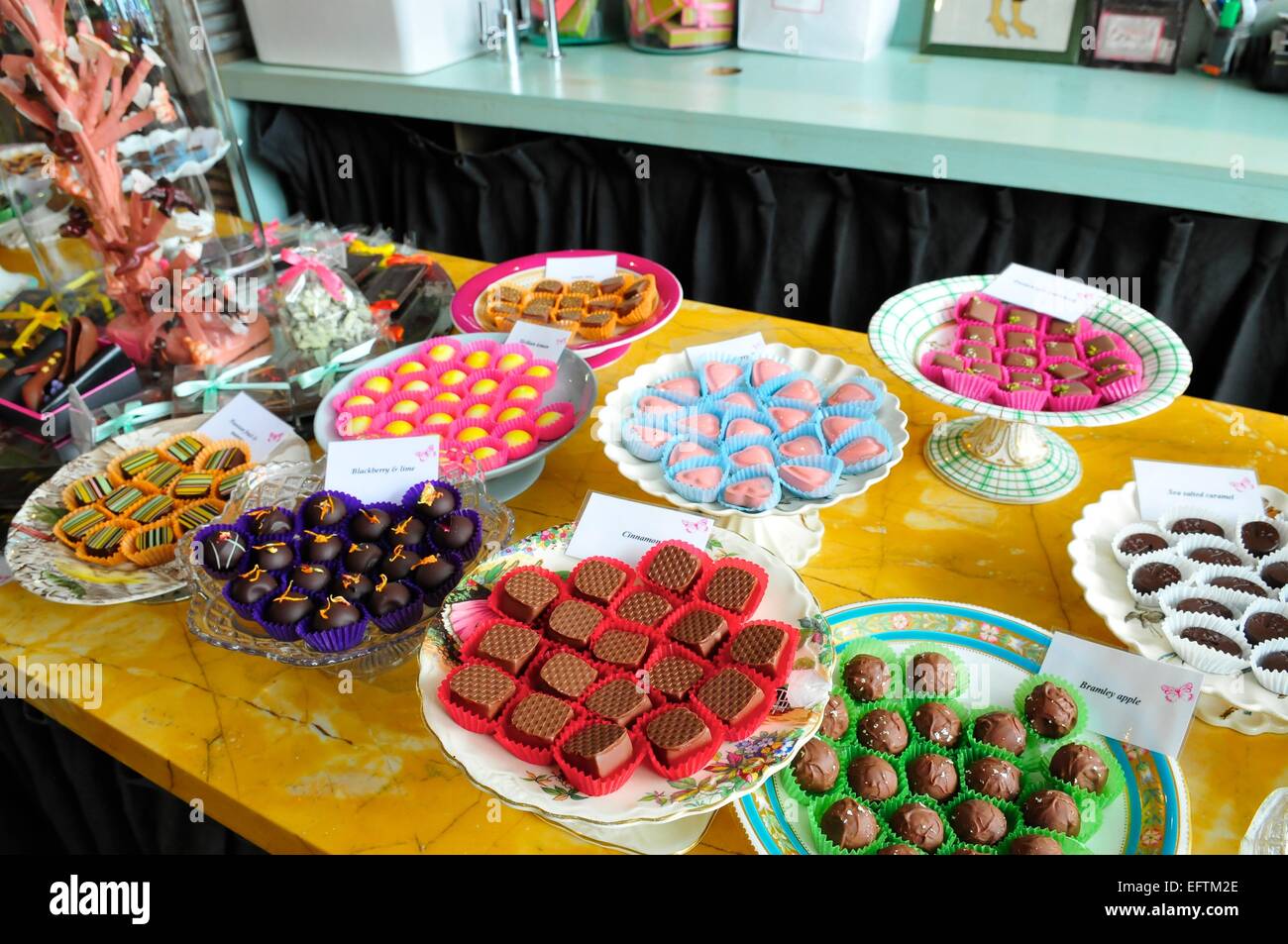 Chocolates Displayed on Plates at Chocolate Shop, London
