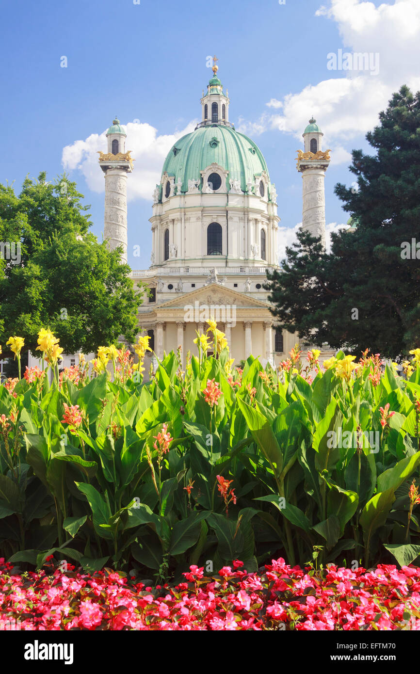 Colorful flowers by the Baroque Karlskirche, in Vienna, Austria Stock Photo