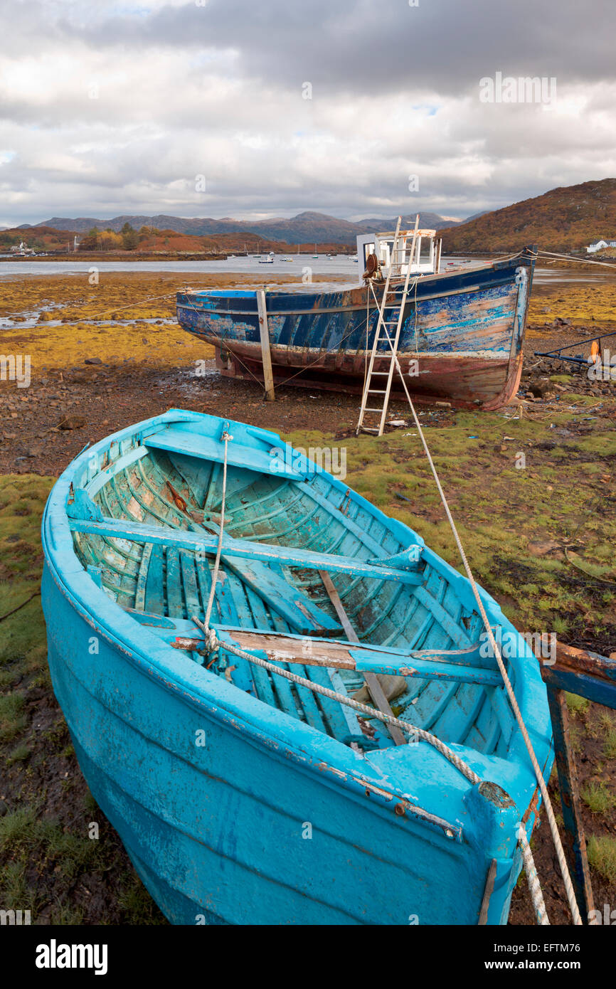 Fishing and rowing boat at low tide, Bedachro, Scotland Stock Photo