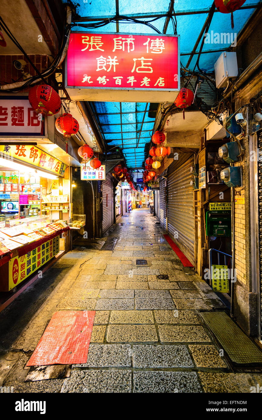 JIUFEN, TAIWAN - JANUARY 17, 2013: Quaint alleys of Jiufen. The town is a tourist attraction renown for a its unique atmosphere. Stock Photo
