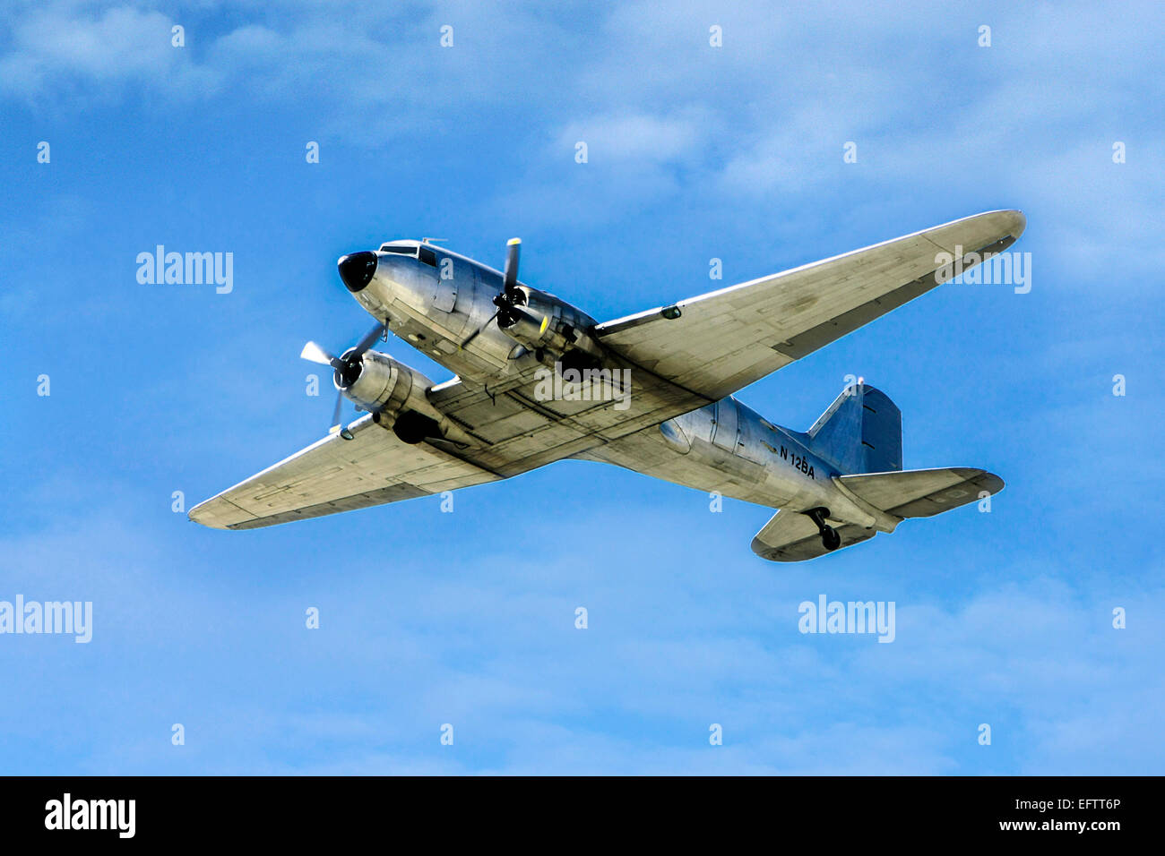 Douglas C-47A (DC3A) flying over Sarasota in Florida. Built in 1943 and now based at Punta Gorda FL Stock Photo