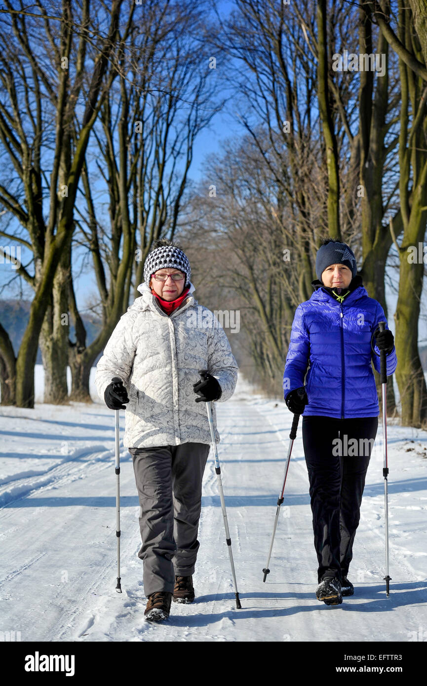 Mother and daughter train nordic walking Stock Photo