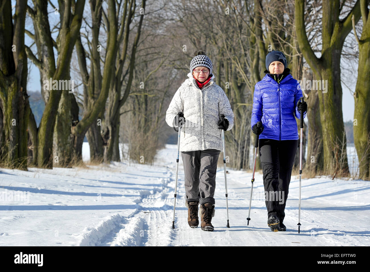 Mother and daughter train nordic walking Stock Photo