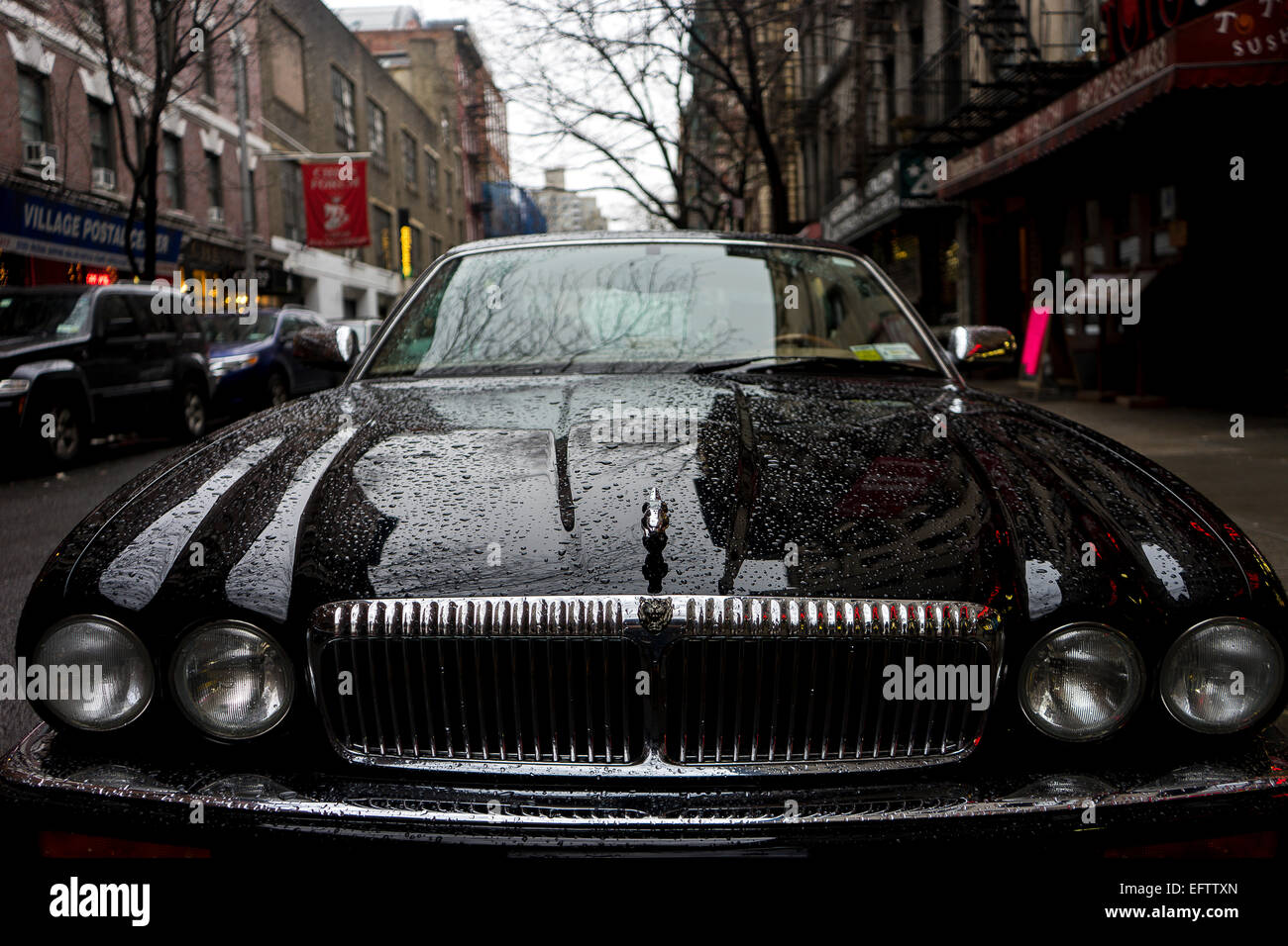 Jaguar parked in the streets of new york Stock Photo