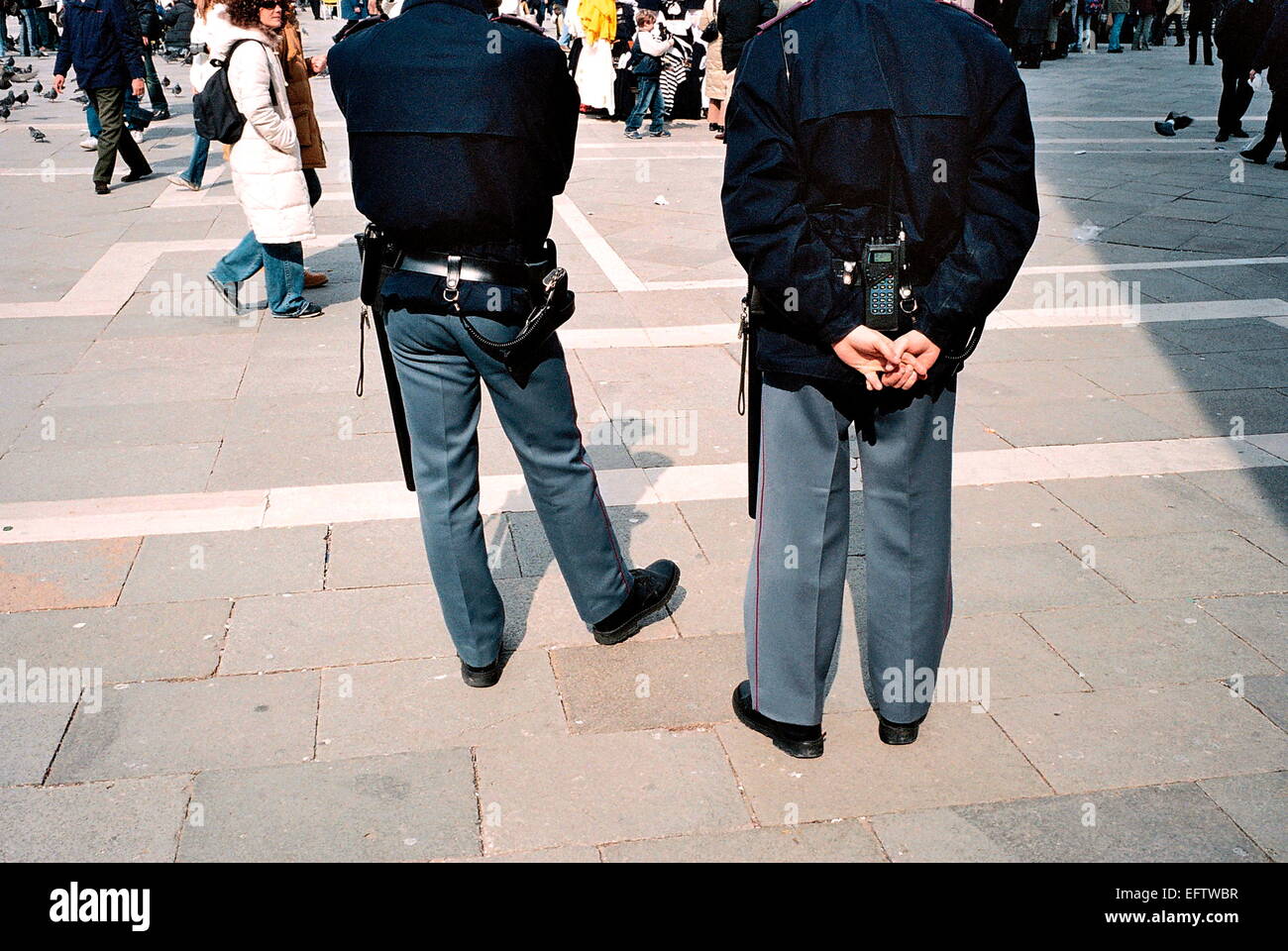 VENICE, ITALY - ITALIAN POLICE WATCHING TOURISTS ON THE PIAZZA SAN MARCO. PHOTO:JONATHAN EASTLAND REF:51011_1920A4290 Stock Photo